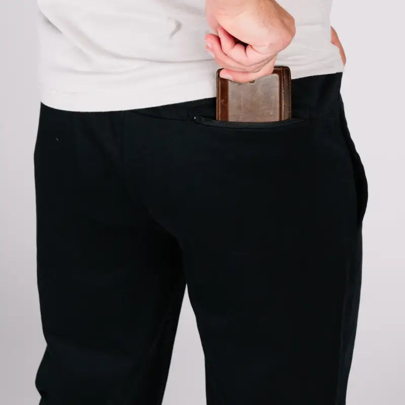 Black athletic pants with patented carrier retention waistband in Carrier Sweatpants Mk.II