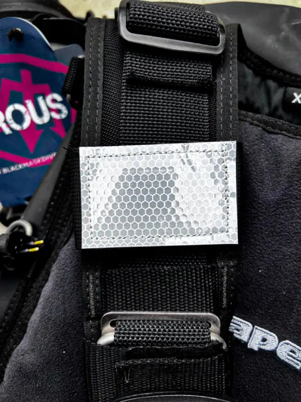 Black BMD Slap Strap with reflective patch and Solas Tape for first responders