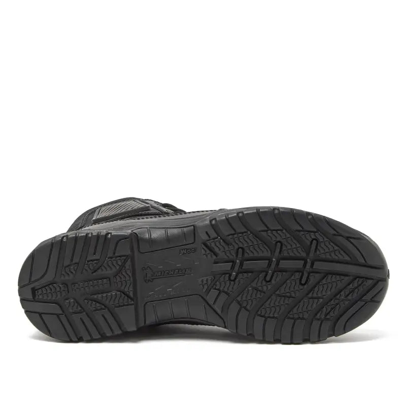 Black boot sole with non-metallic composite for firefighter and first responder safety