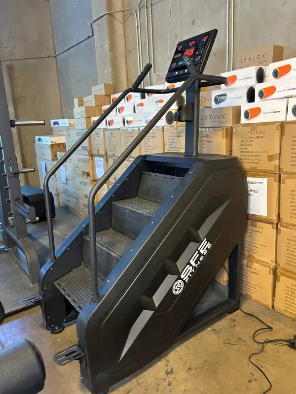 Black SFE Stepmill Pro with revolving steps for a natural climbing motion workout