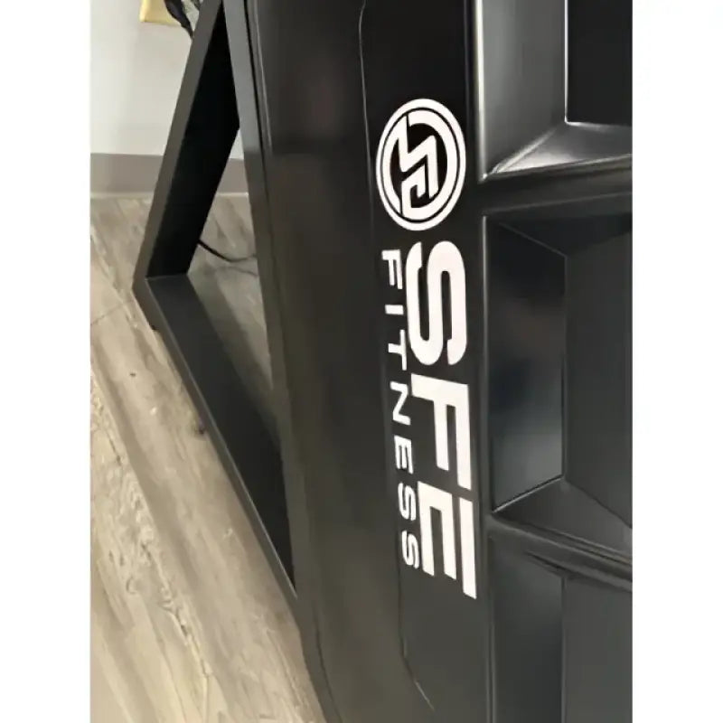 Black fitness equipment featuring SFE Stepmill Pro with revolving staircase and performance monitor