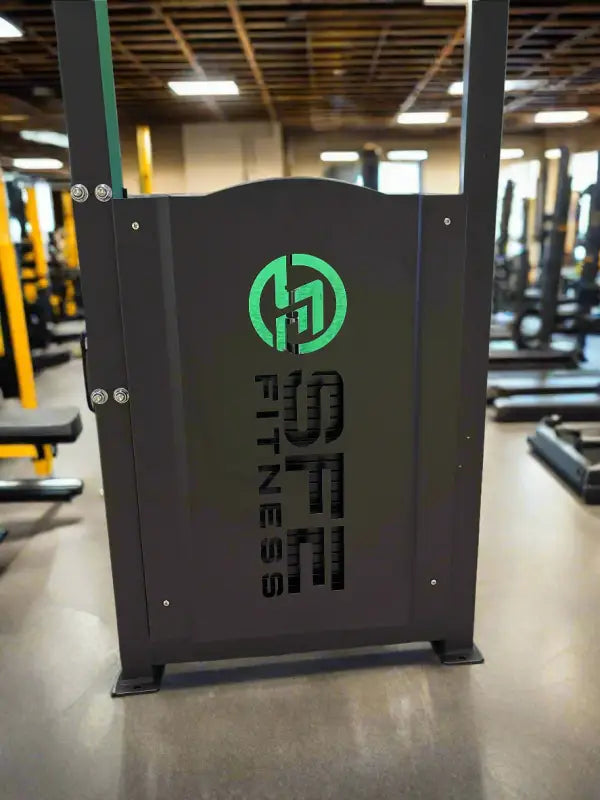Black fitness equipment with green logo for firefighter and police First Responders workout