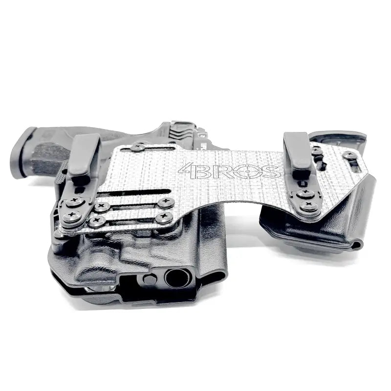 Black gun holster with magazine carrier on 4BROS Fat Guy’s Appendix Rig for concealed carry