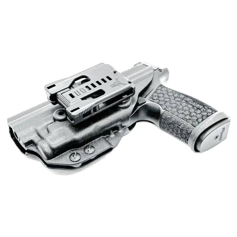 Black Sig Sauer P365-FUSE with light mounted in OWB Kydex holster with adjustable clip