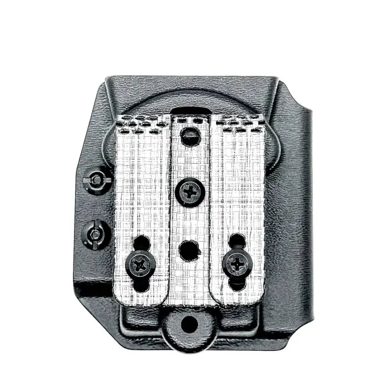 Black Sig Sauer MPX magazine holster with metal clips for secure firearm carry