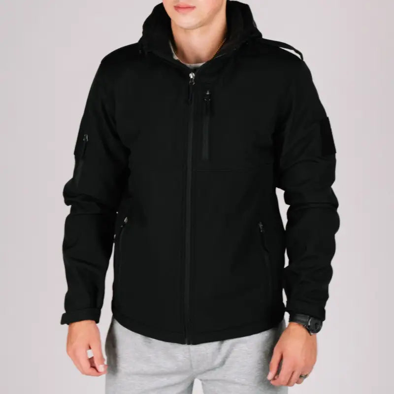 Black hooded softshell tactical jacket Alpha with hand pockets for versatile wear