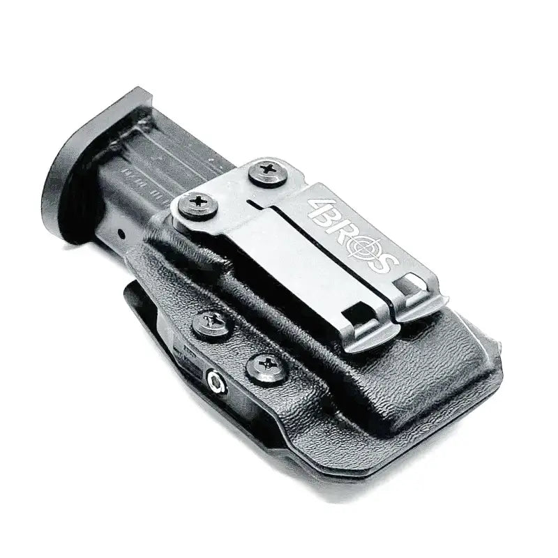 Black Kydex-style P320 XTEN magazine holster with metal belt clip for secure magazine retention