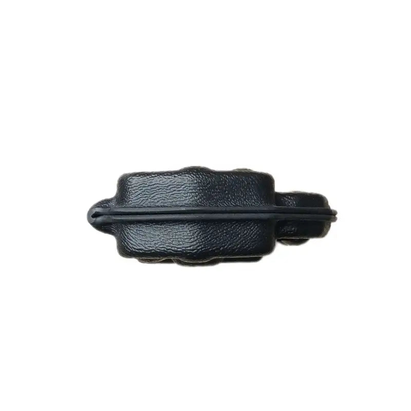 Black leather hair barrette with textured surface for Leatherman Surge, ideal for first responders
