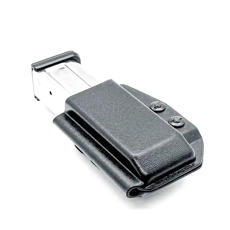 Black magazine holster with metal magazine for secure magazine retention, ideal for first responders