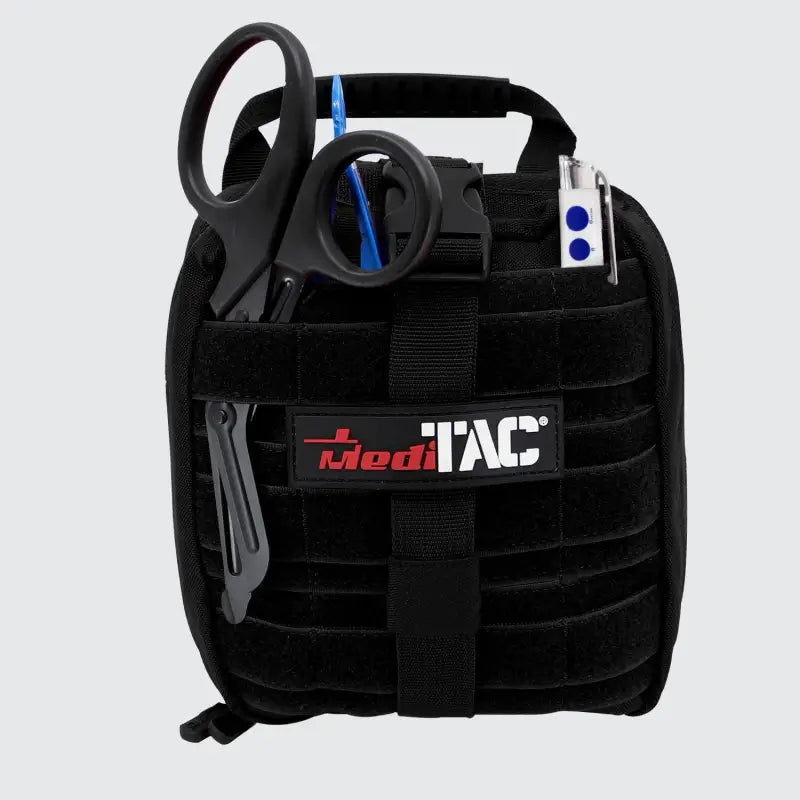 Black medical bag with tools for first responders firefighter and police in tactical trauma kit