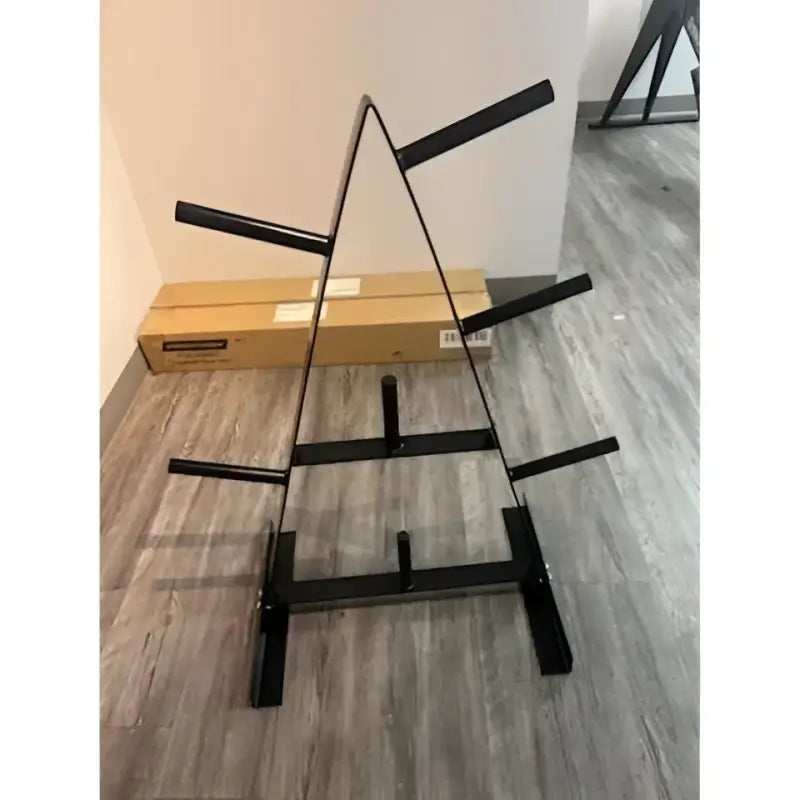 Black metal weight plate rack from SFE Standard for first responders and home gyms