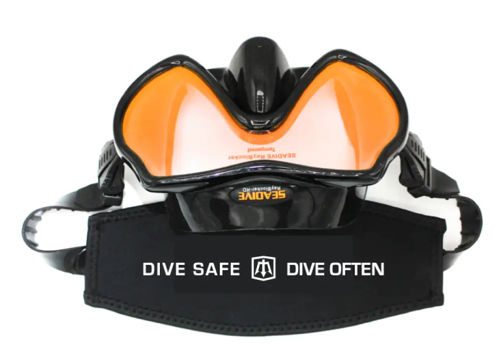 Black and orange diving mask with BMD Mask Strap for secure fit