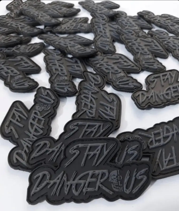 Stay Dangerous PVC patch featuring embossed text for first responders and gear