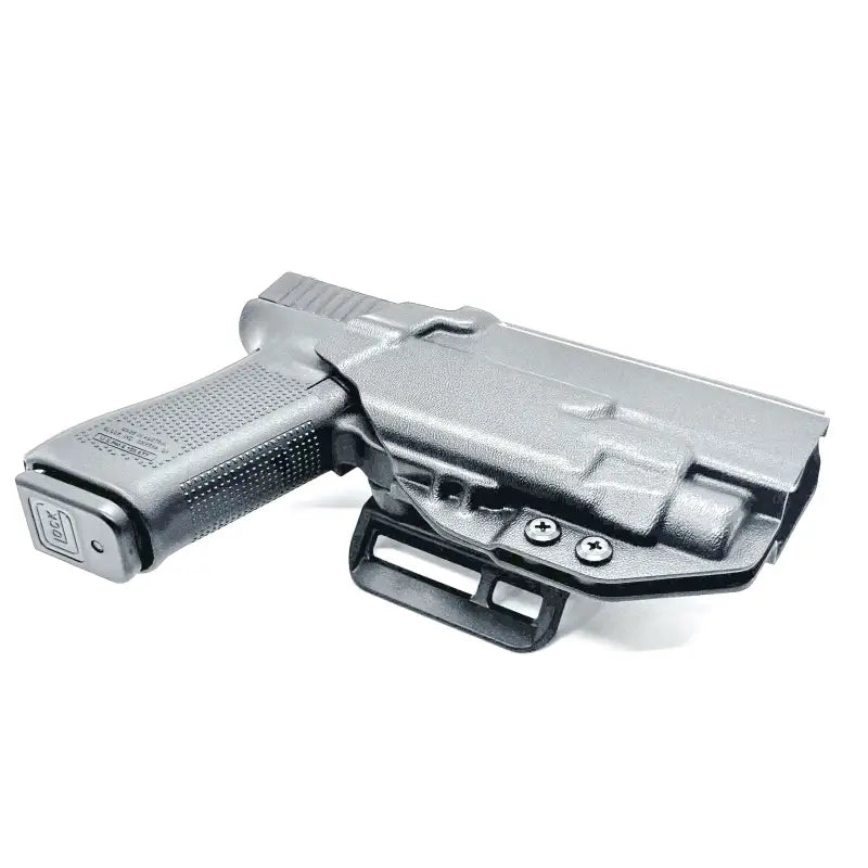 Black Glock 17 pistol with Streamlight TLR-7 HL-X in OWB holster for secure carry