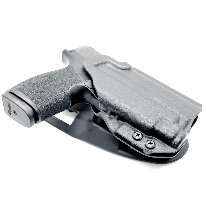 Black pistol in holster with Streamlight TLR-7 or TLR-7 HL-X for P365 X-Macro