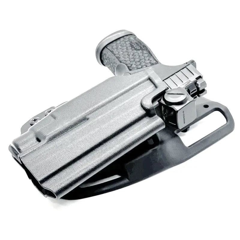 Black Sig Sauer P365-FUSE pistol with Streamlight TLR-7 in Four Brothers Holsters holster