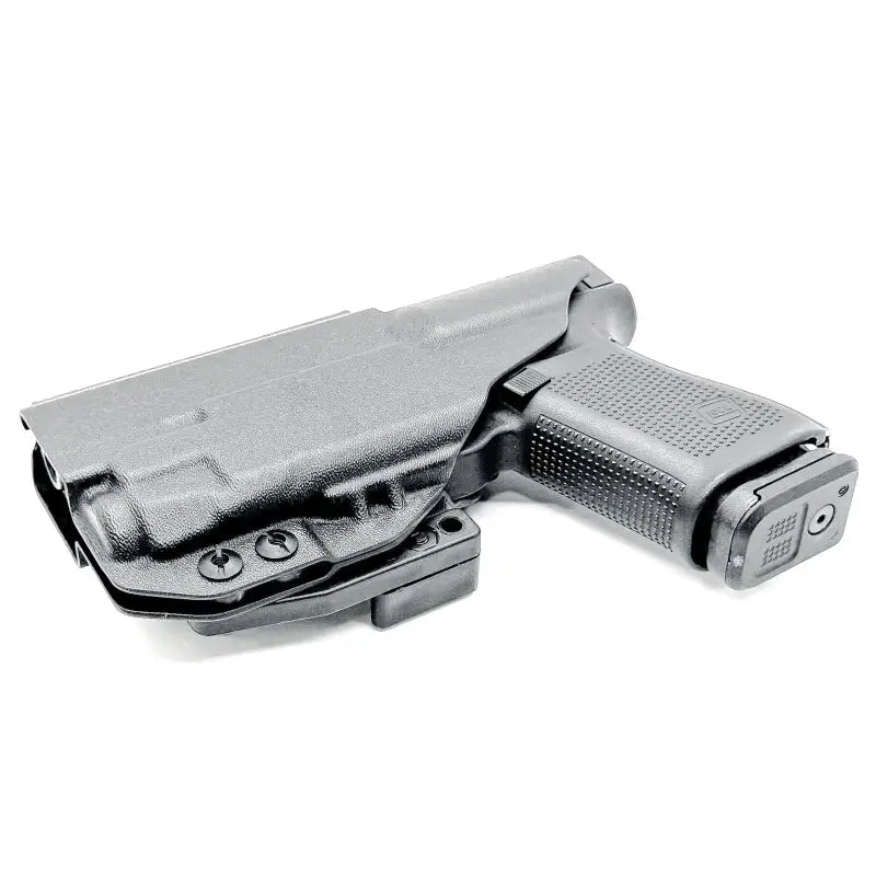 Black Glock 19 in IWB holster with magazine pouch for inside waistband carry