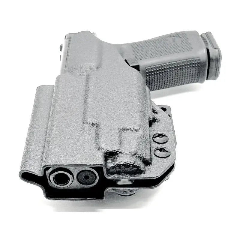 Black pistol in an inside waistband Glock 19 TLR-7 X IWB holster with magazine pouch