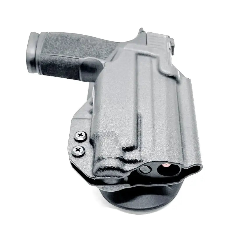 Black P365 X-Macro pistol in holster with Streamlight TLR-7 or TLR-7 HL-X attached
