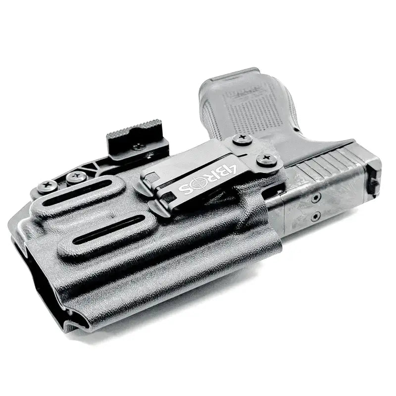 Black Glock 19 IWB holster with firearm and magazine pouch for inside waistband concealment