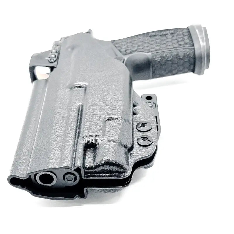 Black Sig Sauer P365-FUSE pistol in matching holster with textured grip and visible barrel