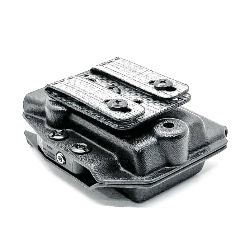 Black plastic Sig Sauer MPX magazine holster with belt clips for secure carry