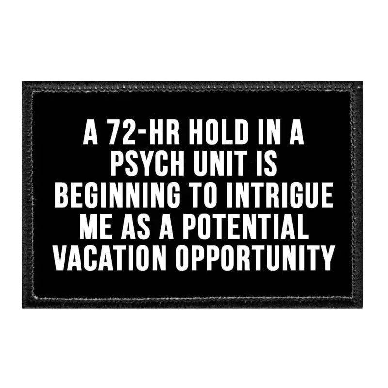 Black patch on velcro loop surface humorously depicts psych unit as a potential vacation opportunity