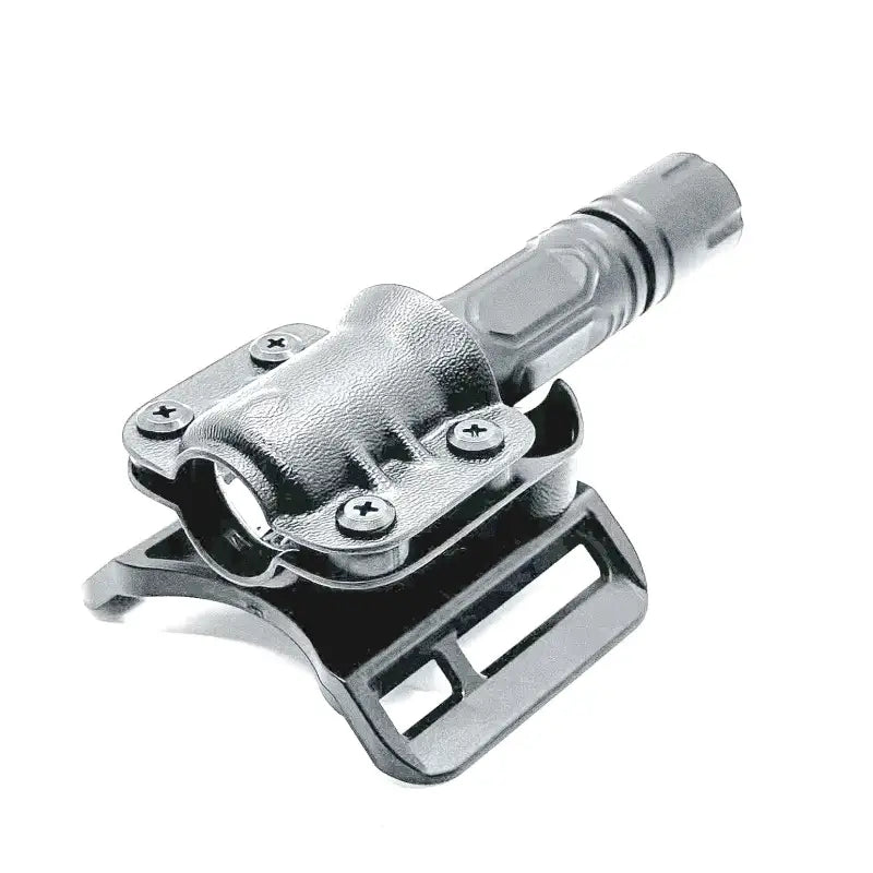 Black tactical flashlight holster with modlite flashlight carrier and safariland QLS fork