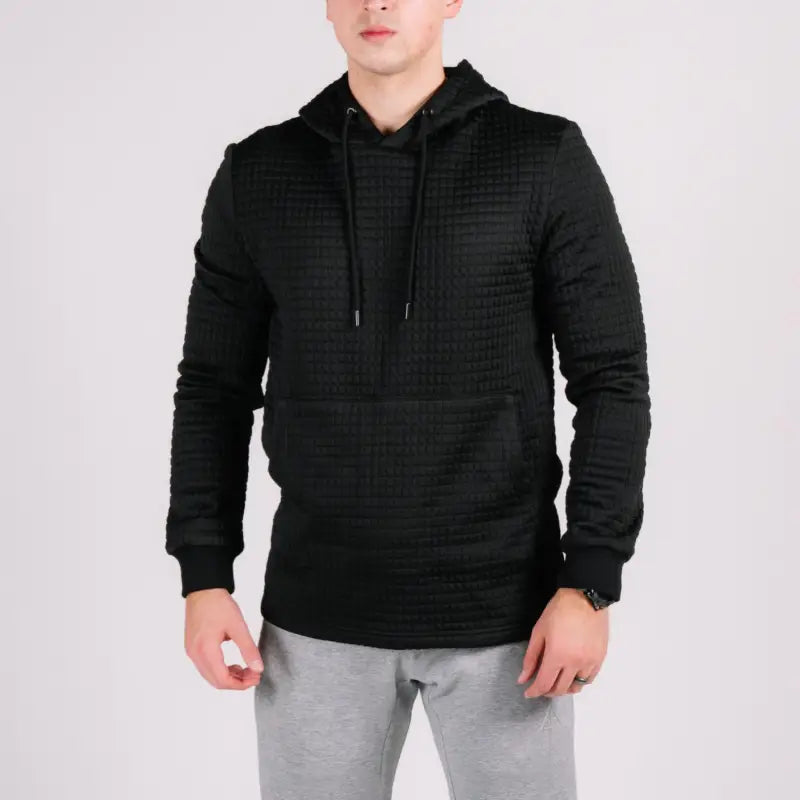 Black textured hoodie with hand pocket from Standoff Concealment Hoodie Mk.II featuring standoff concealment