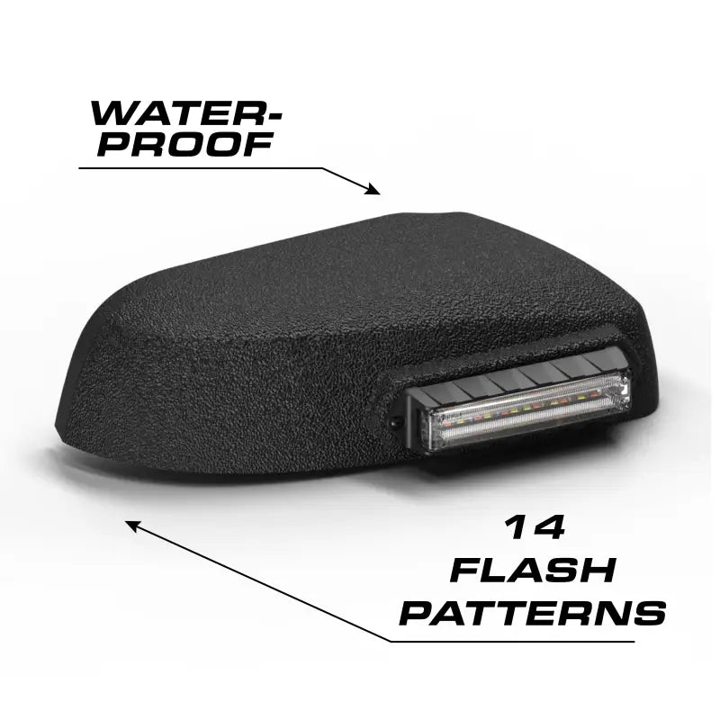 Black textured light with flash patterns on Feniex Q Series Mirror Mount for series mirror setups