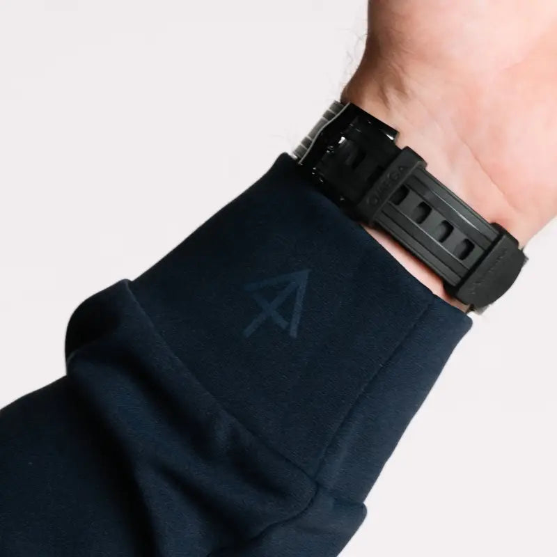 Black watch with rubber strap on Durable Concealment Hoodie showcasing hand pocket and smooth draws