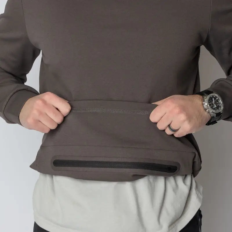 Brown Durable Concealment Hoodie with zippered hand pocket and smooth draws