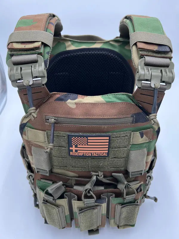 Camouflage tactical body armor with American flag patch from Redemption Tactical, large size