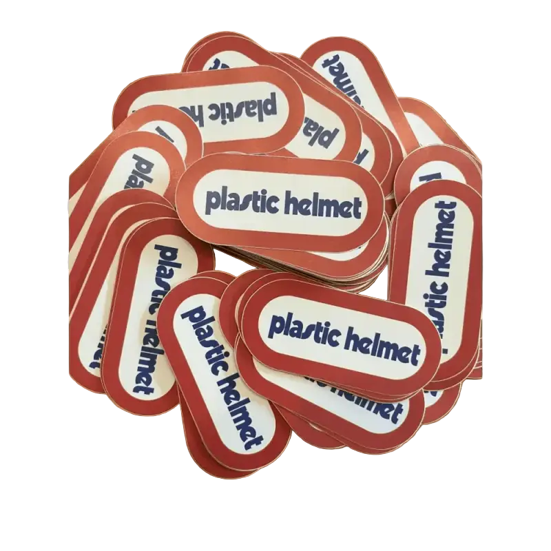 Collection of red and white stickers labeled plastic helmet for first responders and firefighters