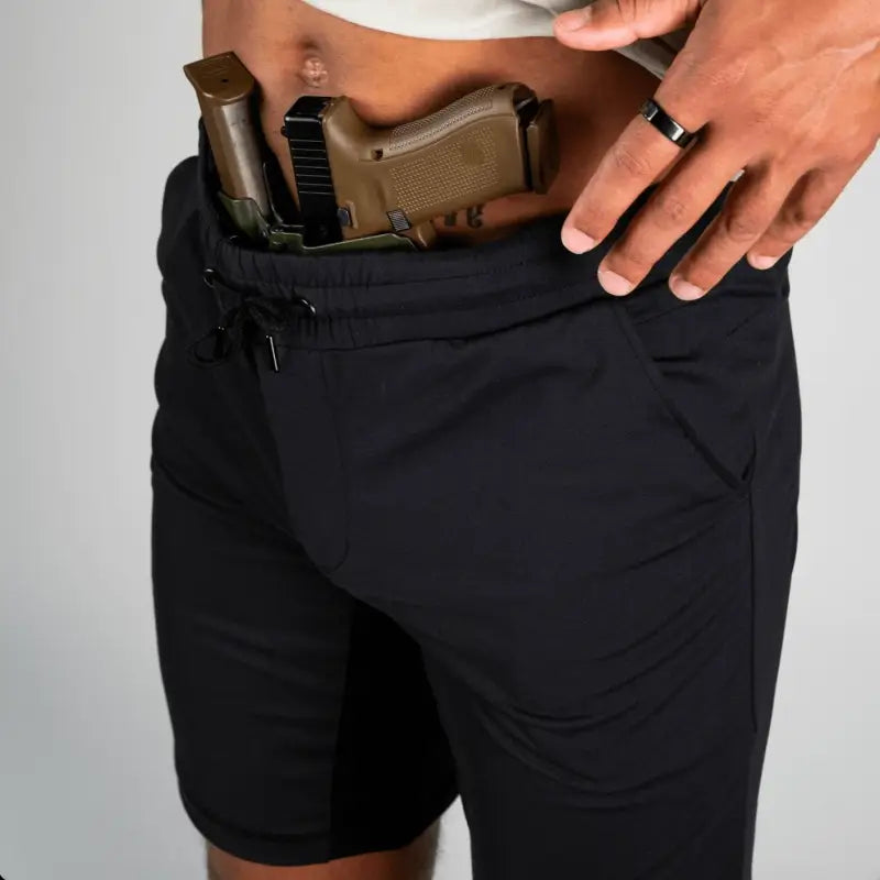 Carrier Shorts Mk.II with concealed carry feature and concealed handgun in black shorts