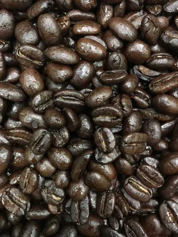 Dark roasted oily coffee beans from Italian Blend dark roast for first responders