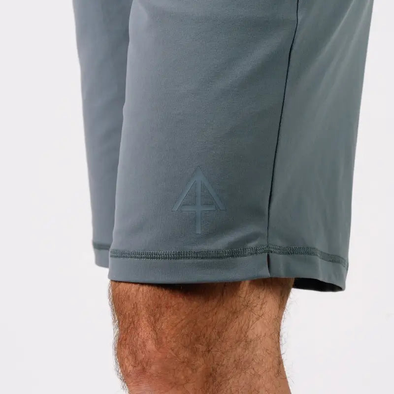 Gray athletic carrier shorts with concealed carry design from Arrowhead Tactical Apparel