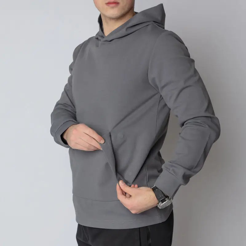 Gray hooded sweatshirt featuring a durable hoodie, hand pocket, and smooth draws for comfort