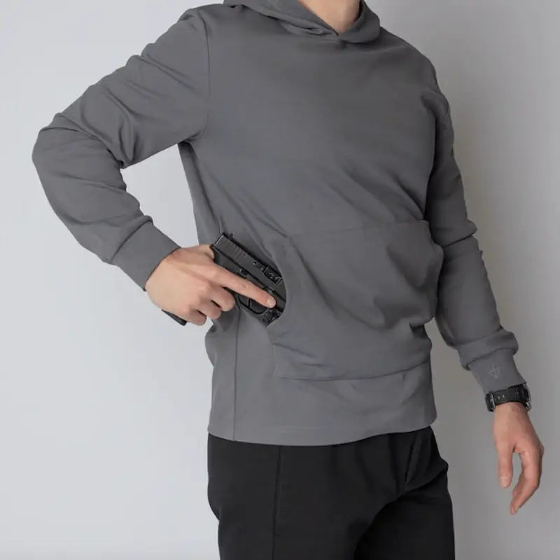 Gray Durable Concealment Hoodie with Hand Pocket and Smooth Draws featuring a gun in pocket