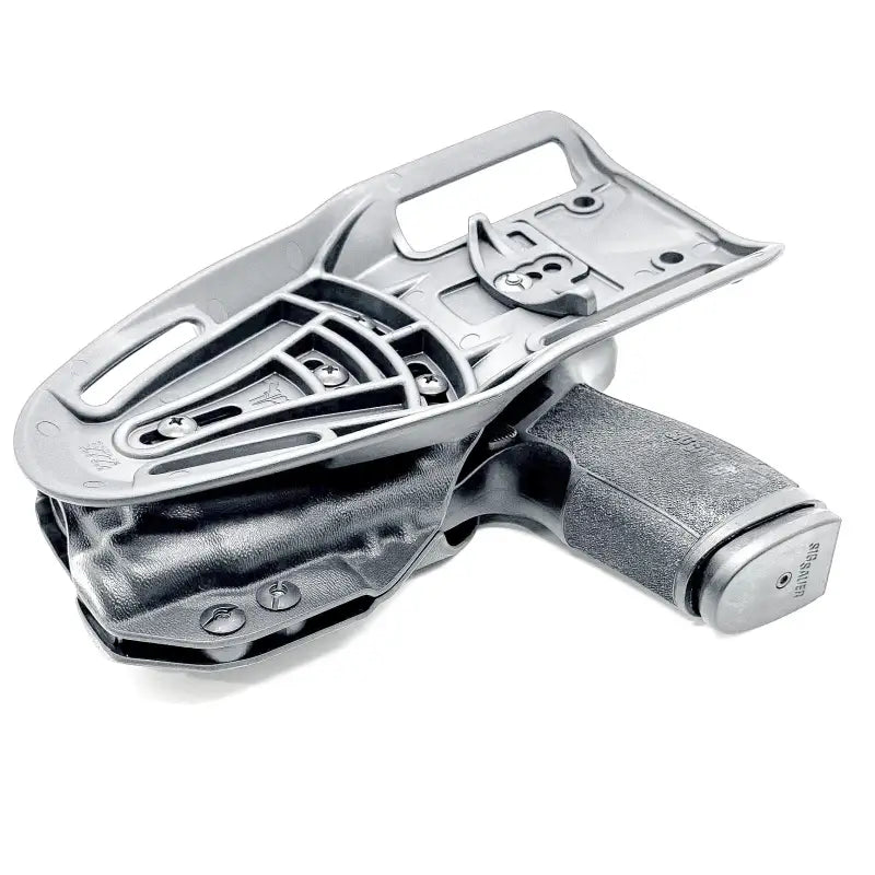 Gray Sig Sauer P365-XMACRO pistol in holster with Streamlight TLR-7 HL-X attachment