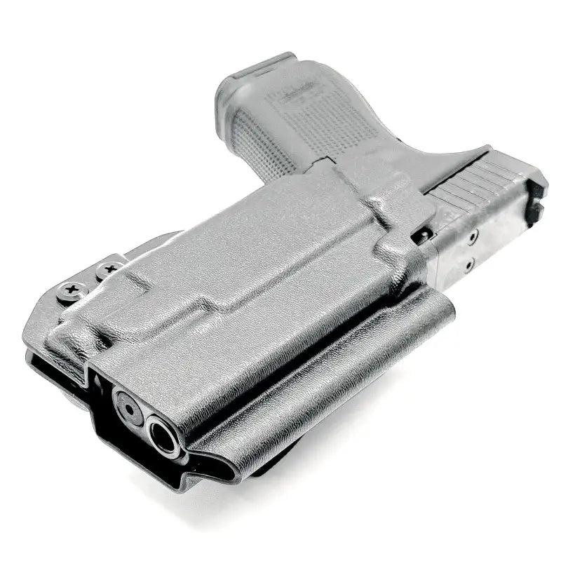 Gray Glock 19 pistol in OWB holster with Streamlight TLR-7 by Four Brothers Holsters