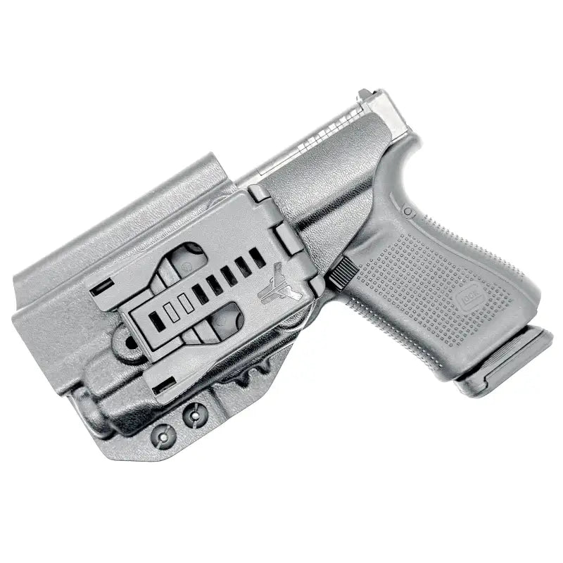 Gray pistol with Streamlight TLR-7 in Four Brothers Holsters OWB Holster
