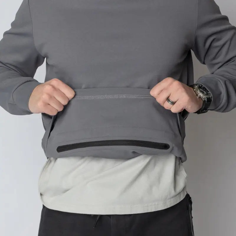 Gray Durable Concealment Hoodie with zippered hand pocket and smooth draws