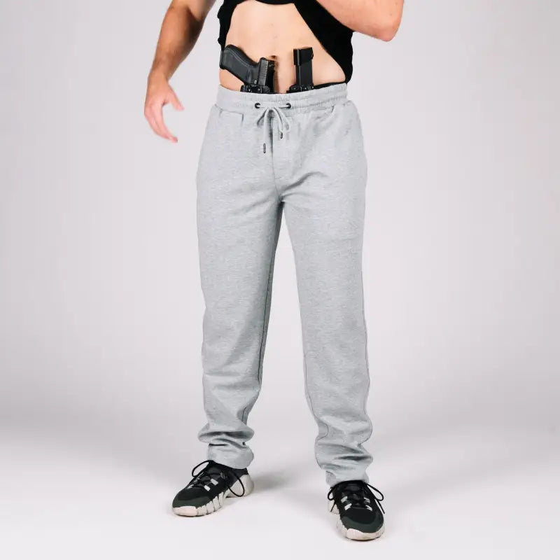 Gray Carrier Sweatpants Mk.II with patented carrier retention waistband and black shoes