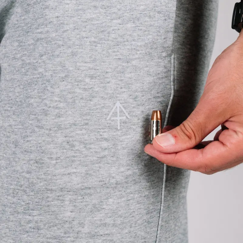 Gray Carrier Sweatpants Mk.II with patented carrier retention waistband and bullet pocket