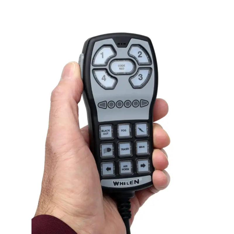 Hand holding Whelen HHS3200 handheld siren and controller for emergency response
