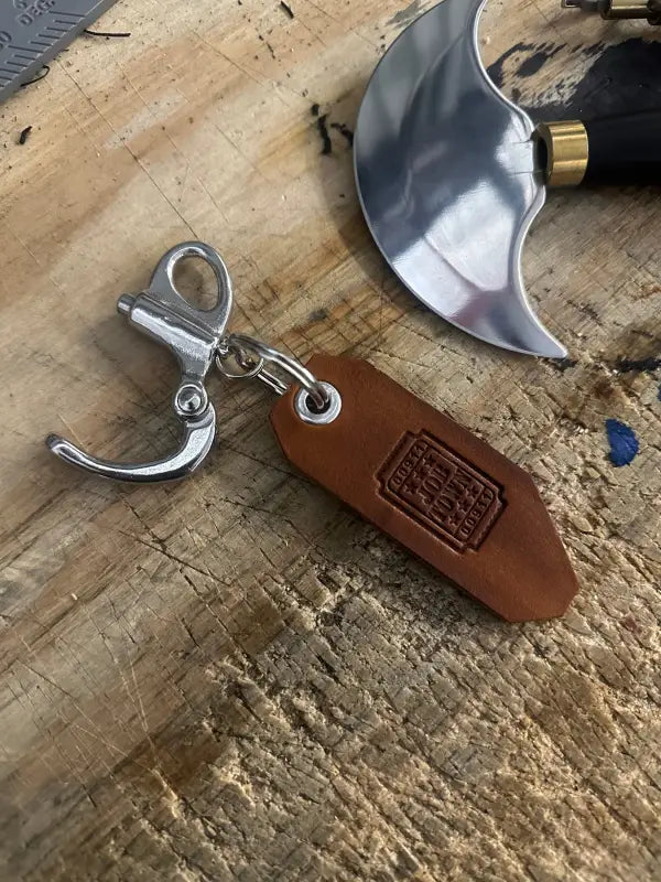Leather keychain with metal clip featuring 50mm quick release clip for easy attachment