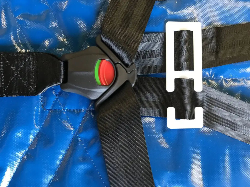 Black safety harness buckle with red release button for LINE2Design Deluxe Pedi Child Restraint