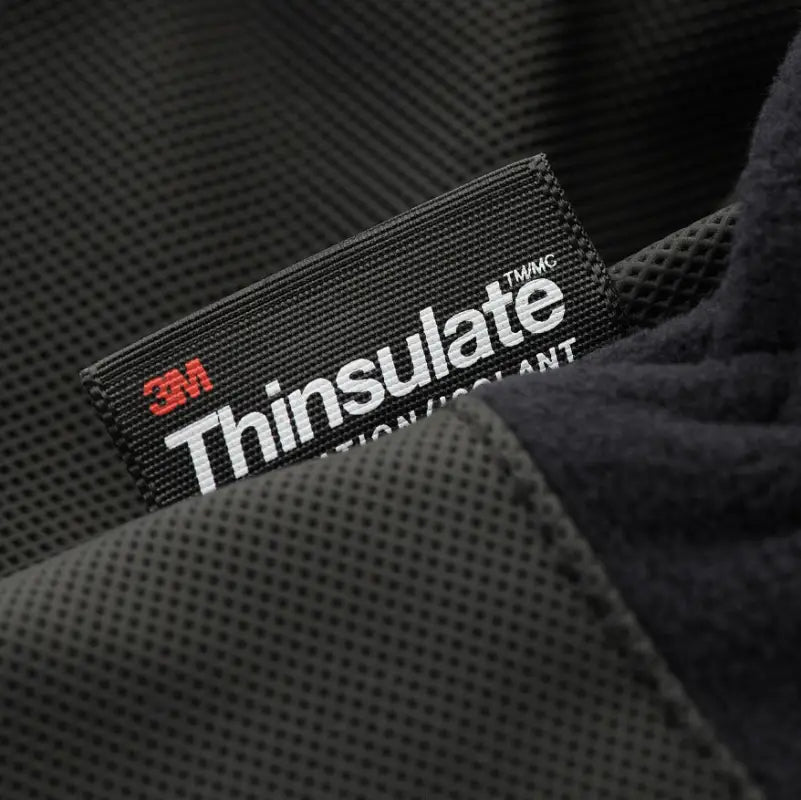 3M Thinsulate label on dark textured fabric of M-Tac Gloves Fleece Thinsulate