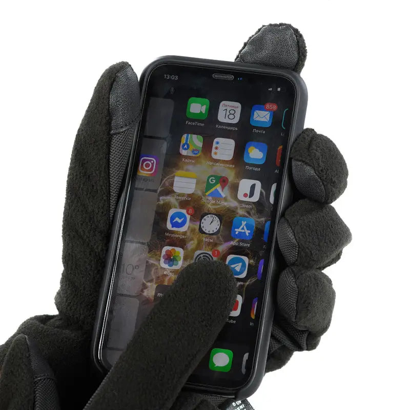 Black gloved hand holding an iPhone showcasing M-Tac Gloves Fleece Thinsulate features